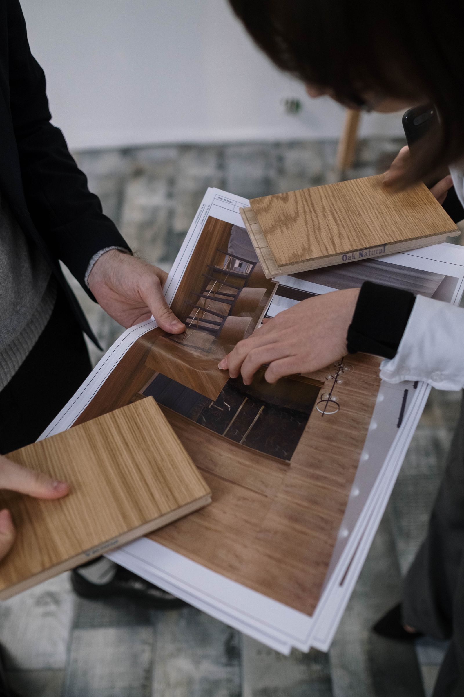 Craftsmanship custom home wood samples compared to design renderings
